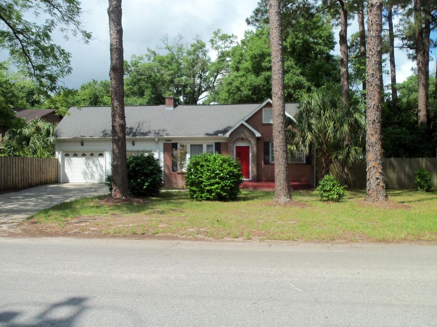 So much to offer. Take a step back in time when you see this home. The floors are hardwood, the real thing! There is a very large Living Room with a real wood burning fireplace which is accented by arched windows on each side. There are glass door knobs on some of the doors. The kitchen is spacious with lots of cabinets, an electric stove/oven and dishwasher and a window over the kitchen sink. The two bedrooms are large and there is one bath in the house. There is a bonus room as well. Wait there is more, there is a one bedroom apartment that is separate from the house and has its separate parking and entrance that you can rent out or a family member could live there. There is an open court that is private and can be utilized by everyone. This could be a great office for a lawyer or doctor