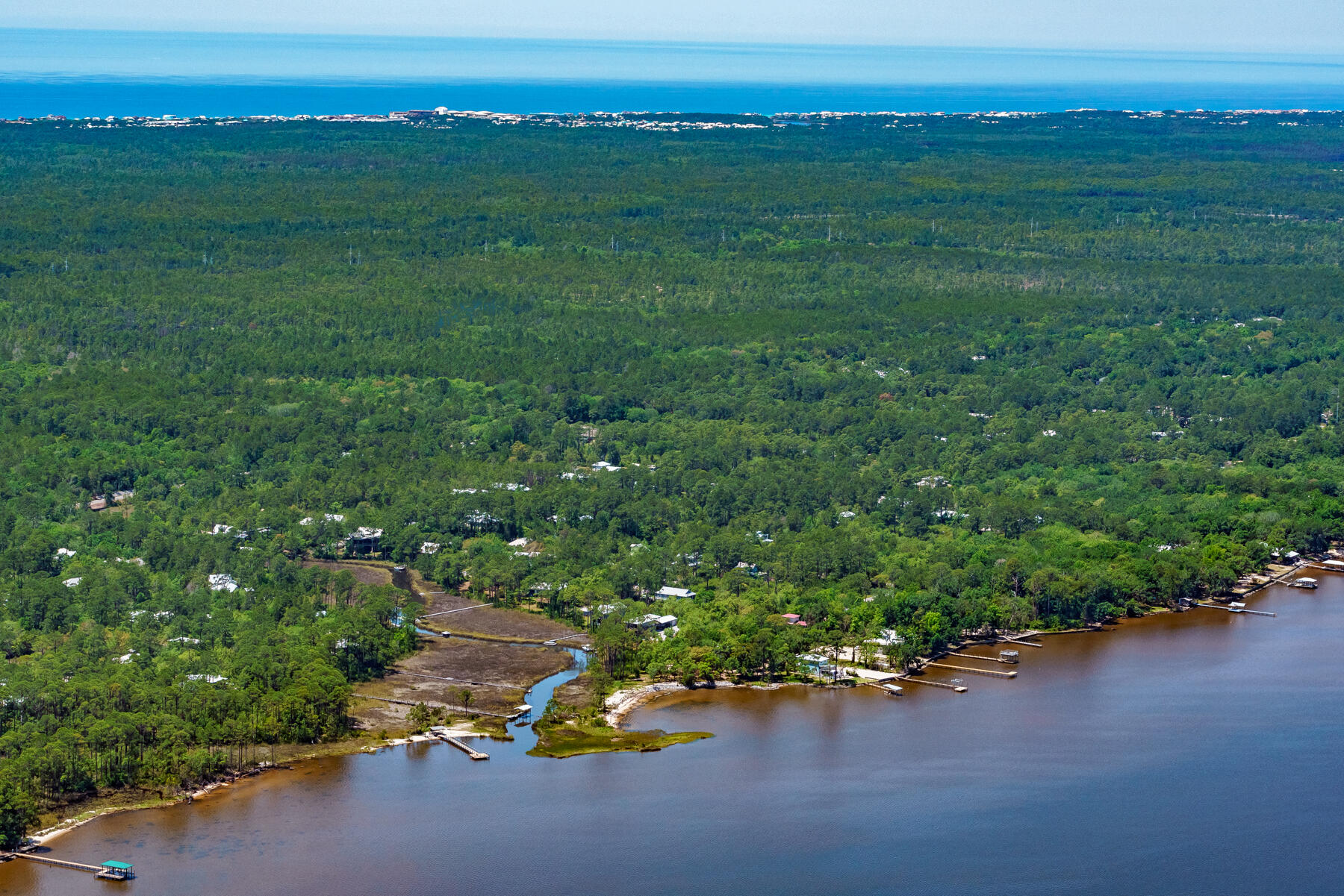Entered for comp purposes only. Only two blocks from the Choctawhatchee Bay this wooded lot in the heart of Point Washington is perfect for building your dream home. A community boat launch within walking distance offers the ability for boating, fishing, paddleboarding, and so much more. Only a short drive to 30A for shopping & dining or Grayton Beach to soak up some sun.