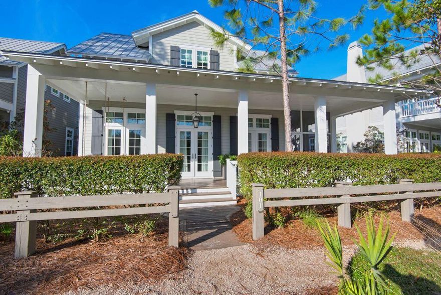 Rediscover the Southern charm and hospitality in one of the premier homes in Watercolor. Imagine family and friends gathered in cheerful conversations on the large front porch, as passersby wave in friendly cheer. The exterior of the home features beautiful porches, with a side screened porch open to the interior dining area. The centerpiece of the home is the living/dining/entertainment area which has tremendous volume with 12ft ceilings.The kitchen mixes well with this area and includes ice maker, wine cooler, and free standing island. The main suite and an office are located on the 1st floor. Moving to the 2nd floor, there are 2 additional bedrooms with en suites, plus a 4 bed bunk room and 1/2 bath plus an entertainment area.The carport and driveway have room for 5 vehicles!