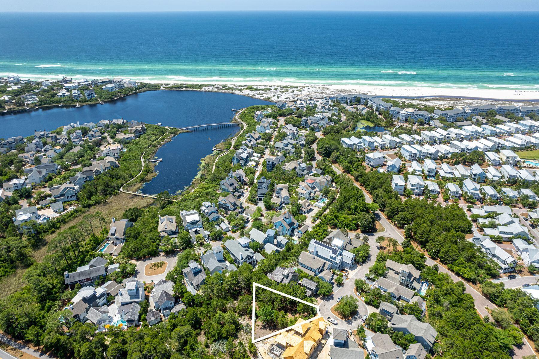 WaterSound Beach resides on 1,400 acres and offers almost a mile of linear private white sugar sand beaches. Enjoy 2 beautiful community pools, a dock access to Camp Creek Lake, Puttering Park, a state-of-the-art fitness center or one of the 6 boardwalks over the iconic sand dunes of WaterSound leading to the Gulf of Mexico. The culmination of amenities and exclusiveness affords residents with the epitome of private coastal living while remaining geographically poised near the world-class dining and entertainment venues 30A has to offer. One of just a few homesites left in this gated community.  This property is situated at the end of a quiet street in the Bridges district. It presents a perfect opportunity to build your dream home in one of the most beautiful and private neighborhoods