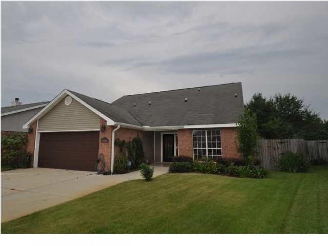 This large 5br/2.5 ba with 2 car garage and extended driveway can accommodate a growing family in a great residential hometown neighborhood in beautiful Destin florida. Remodeled kitchen open to living area with fireplace. Master BR with ensuite travertine wall tiled bath with walk in closet and shower and 1/2 bathroom on 1st floor . all with custom vanites. . The 4 other bedrooms and 1 bath with bath tub upstairs. 2500 carpet allowance. Tile downstairs and carpet upstairs. Nice fenced in yard with screened in porch and a pergola.New roof 3 yrs,ac ,water heater 3 yrs and 1 yr garage door opener.granite counters with stainless appliances. Nice bath custom vanities. Doggie doors to fenced in yard. Upstairs carpet allowance offered.
