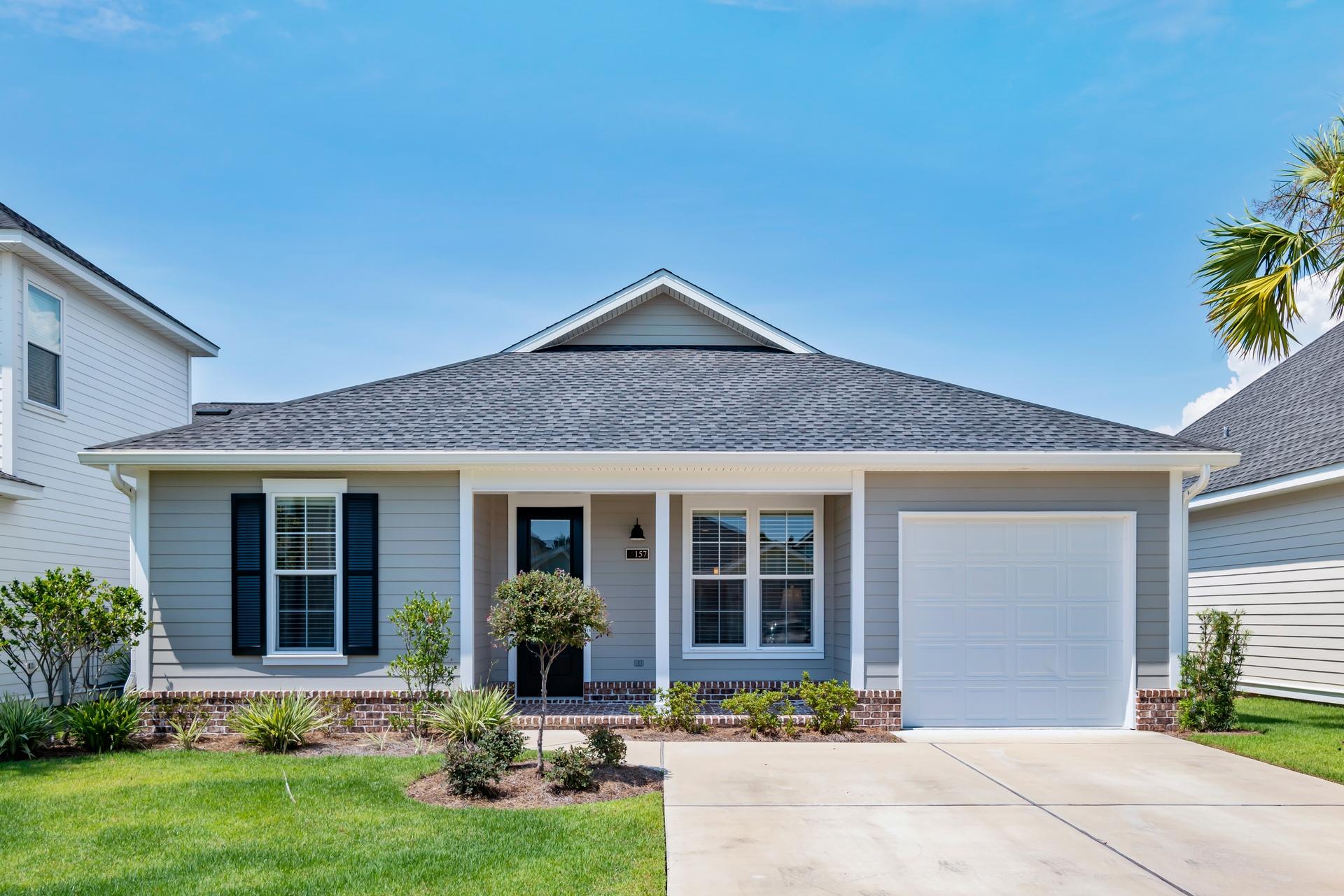 Like New! The ''Ashley'' is a cozy, single-story plan w/2br, 2bth w/office & 1 car garage, perfect for anyone downsizing or a coastal 2nd home. The cushy OFFICE is a plus and the charming kitchen adorns quartz counter tops, wood cabinetry with ''soft close'' hardware hinges & stainless steel appliances. Bedrooms are spacious w/Master suite has a walk-in closet, dual vanity & beautiful tiled master shower w/frameless door. Core-Tec wood flooring throughout (NO CARPET) w/porcelain tile in bathrooms. 9'ft ceilings, 8'ft doors, recess lighting throughout and fenced backyard. Well-kept community w/HOA lawn service, community pool, dog park, playground & fully equipped exercise room! The overall detail of the homes & community is unparalleled.