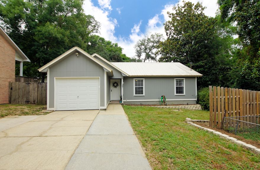 Adorable family home walking distance to Edge Elementary School. Low maintenance home with metal roof and storm shutters (stored inside the shed on property). New HVAC unit in 2017. This home has been well cared for & kept clean and neat as a pin! Tile floors & countertops have all been professionally steam cleaned. Huge deck for relaxing in the back. Just minutes from Eglin AFB & the beaches!