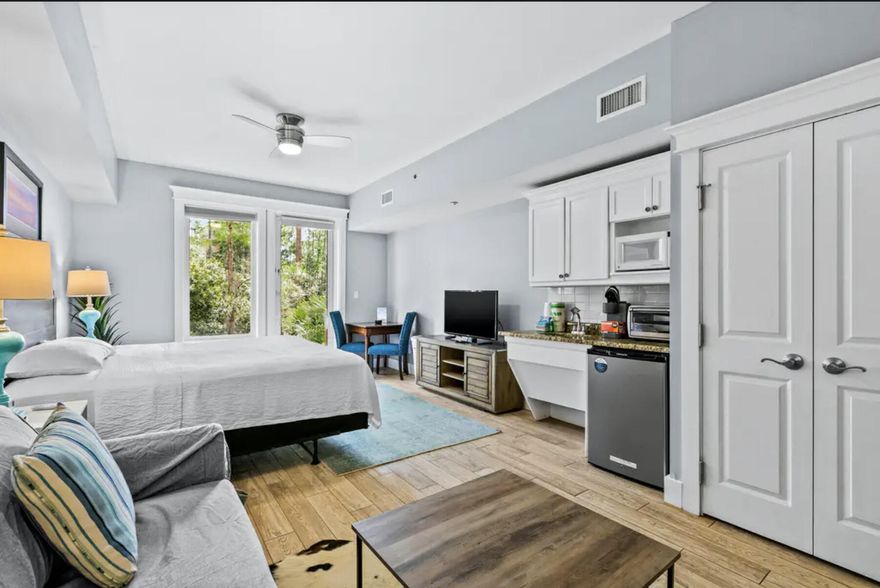 Step into your pristine vacation oasis! This studio located a short distance to The Village of Baytowne Wharf makes for an amazing investment opportunity and weekend getaway. Adorned with chic furnishings, the unit is turn-key and rental ready. You will also love having easy access on the ground floor with your own private back entrance. Completely updated in 2021 with a new AC, wood-like tile flooring, granite countertops, window treatments, a wireless front door kaba lock, and fresh paint, you will have every comfort needed for the perfect stay in this bright and beautiful unit. Lasata owners also enjoy access to the Solstice Club, a private Bayfront entertainment space featuring outdoor cooking area, clubhouse, screened porch, & fireplace.