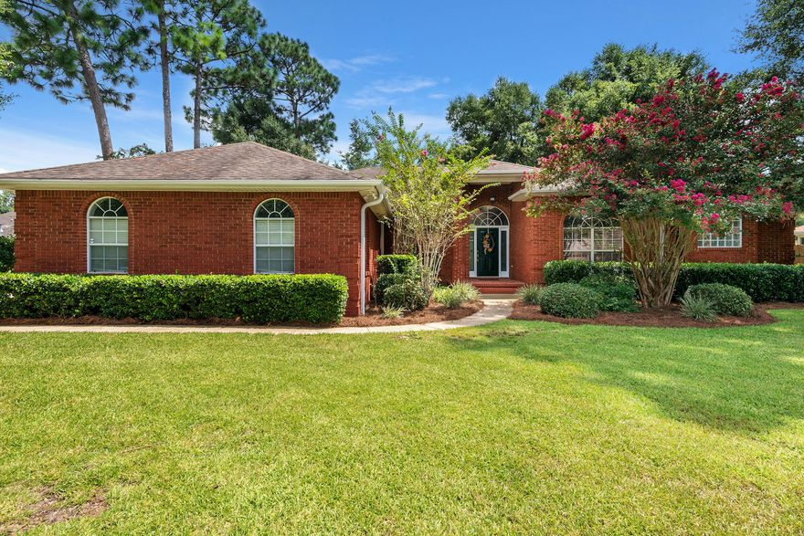 Impressive brick, contemporary home in Rocky Bayou on lavish corner lot. What will you like? The high, trey ceilings, open floor plan, split bedroom design, new carpet, new paint, crown molding, palladian windows and updated features. Elegant living room with built-ins and bright windowed view of the large Florida room and nature-filled back yard. The master bedroom is private, with sliders to Florida room. Master bath has new faucets, lights, remodeled shower, whirlpool tub. Granite kitchen counters, stainless refrigerator, oven, Bosch dishwasher, disposal and undermount sink all newer. This home has abundant storage with two pantries and extra cabinets in laundry room. All bedrooms have trey ceilings. Fourth bedroom would make ideal office. Make this stand-out Rocky Bayou home yours.