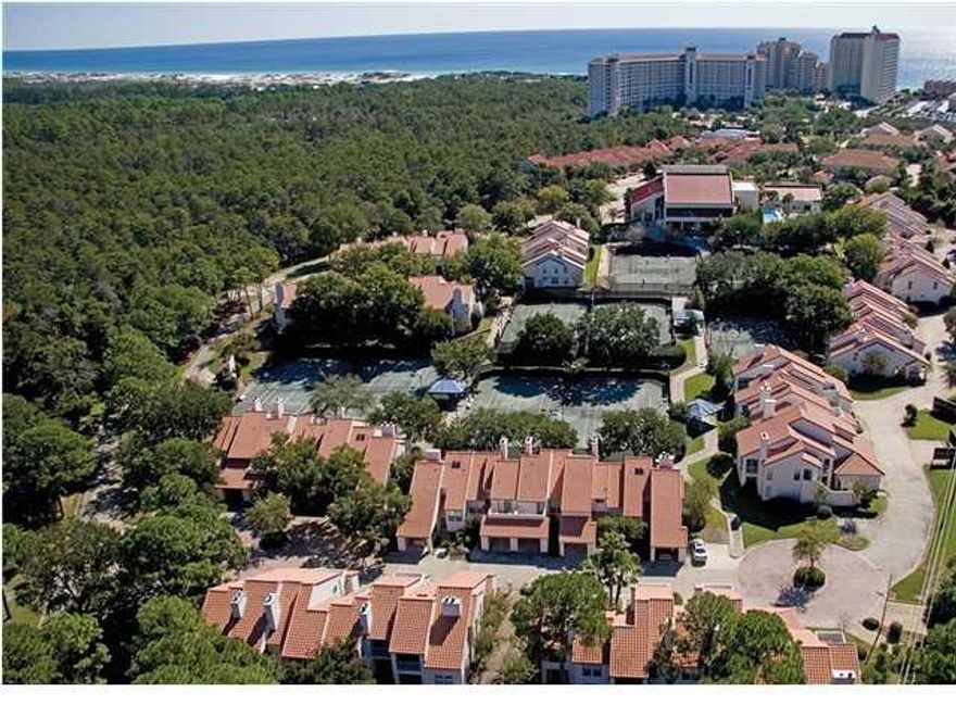 30 Forest Hills Lane is a ''Tennis Village'' condo located within view of the #10 tennis court. Tennis Village 30 offers a 2 bedroom 2 bathroom unit with 1,178 sq ft. Tops'l Resort is surrounded by 52 acres of beautiful landscape, walking trails and 600 ft of deeded beach front for your enjoyment. Amenities include: spa, pro-shop, fitness center, 24 hour gated security, Tiki bar and grill, tram service, 10 Rubico Clay Tennis Courts including 10 lighted courts, putting green and an indoor/outdoor pool. Interior pictures soon to follow