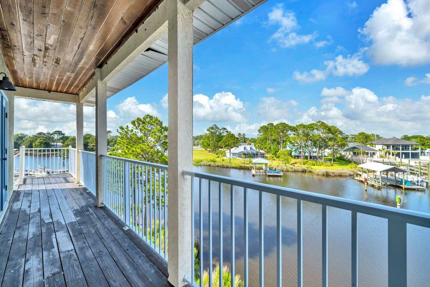 Ready for Stunning views of the Lagoon? look no farther, this 2 bed 2 bath unit is situated on the top floor of this waterfront building. It has beautiful views of the Lagoon, Watch the dolphins play in the mornings while you drink your coffee from your back balcony. This unit has many possibilities, Can be used as short term vacation rental or just a second home to come to when your in town. It has so many possibilities. This unit is a block from the beach and  has a dock to park your boat at while cruising for the day.  Or inquire about the boat lift/storage that is available for rent separately.