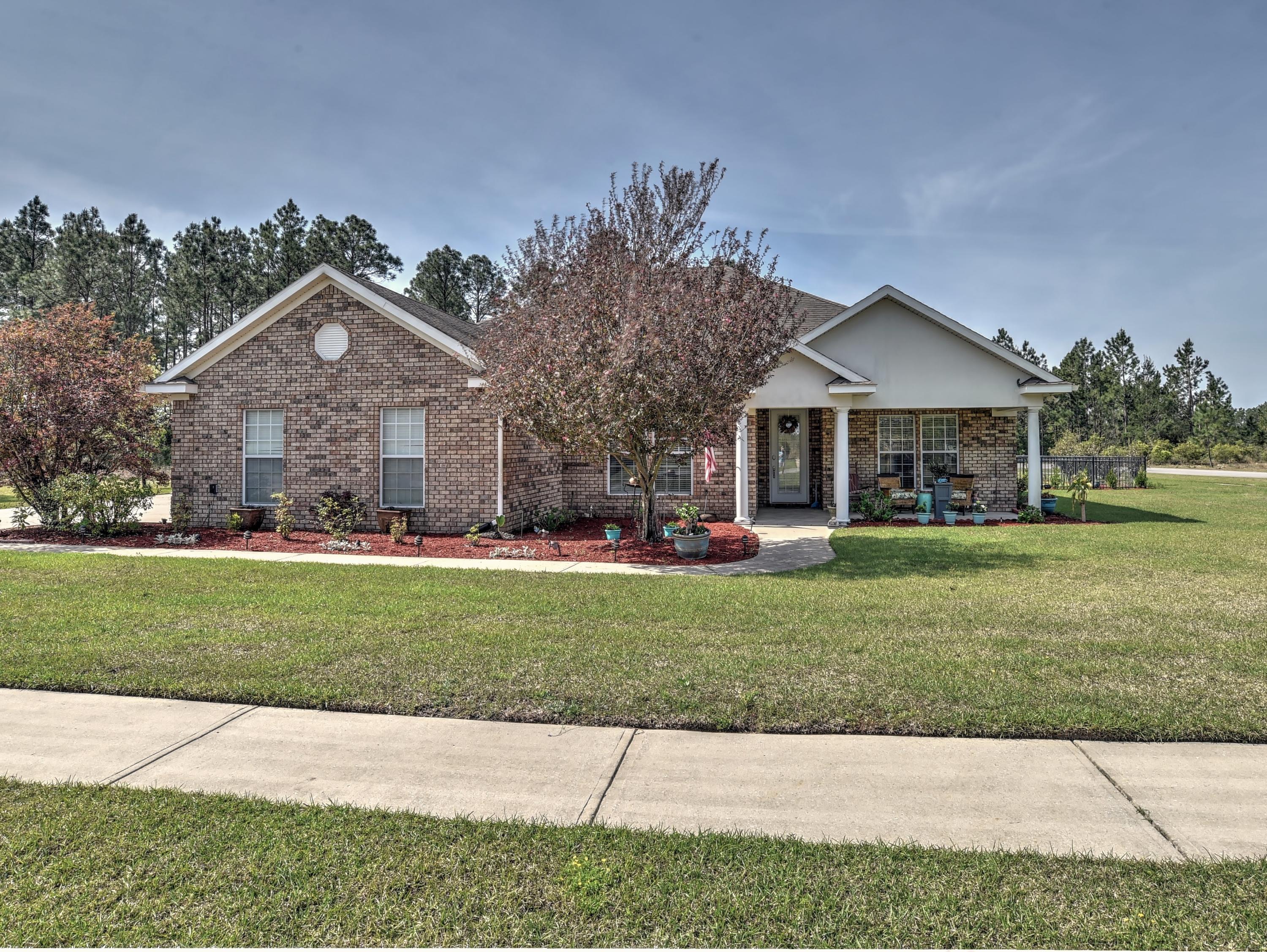 This home is located in Windswept Estates a golf community. It boasts a great open floor plan with a Hugh kitchen and great room with fireplace. It all opens up to a large back yard with a beautiful pond. The master suite has a very large bathroom with a two head shower. The walk-in closet has plenty of room for your cloths. The two other bedrooms have an adjoining bath. Very well manicured landscaping. Built in cabinets in the great room. Great home for a growing family or just the two of you!