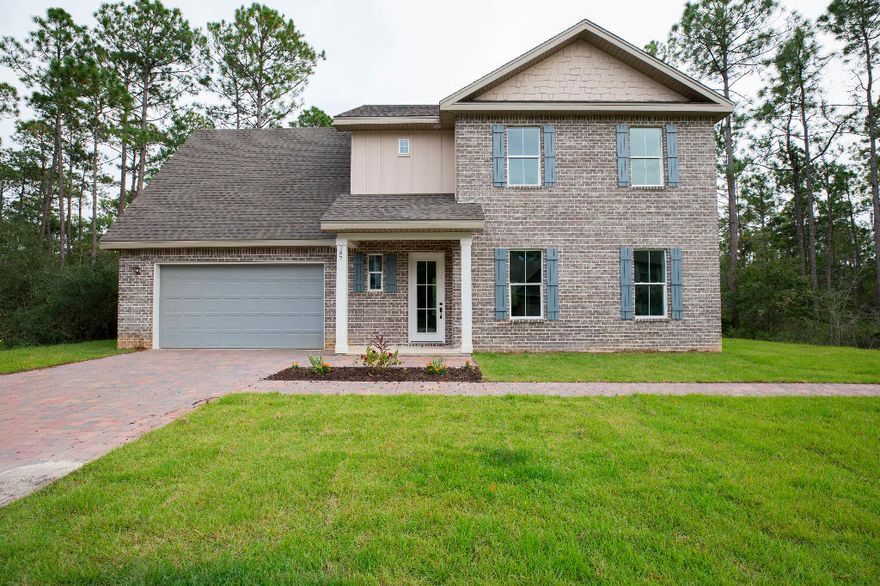 New construction house offers 4 bedrooms, 2.5 baths with huge bonus room and spacious 2 car garage. Master bath features a separate shower as well as a free standing bathtub, master walk in closet with a separate ''his'' closet. Kitchen features white cabinets with soft close, quartz tops, stainless steel appliances, pot filler for your convenience, crown molding, vinyl floors, energy efficient A/C units for each floor, plenty of pantry space, additional closet space under the stairs, on the main floor. Irrigation system installed. Exterior all brick. Beautiful house with a perfect location, quick drive to beach, shopping, schools, groceries. It backs up to a forest preserve and makes a great location for peaceful evenings or family events.