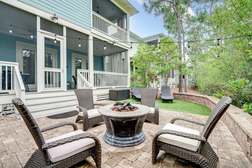 Welcome to this amazing beach chic home located in the highly sought-after NatureWalk at Seagrove neighborhood! If you're looking for the perfect blend of comfort, style, and entertainment, then this is the place for you.  Situated on the closest street to the beach, this home boasts one of the most popular open floor plans. What sets it apart is its larger lot size, allowing for a truly magnificent backyard. The custom design is a one-of-a-kind masterpiece, ideal for hosting gatherings and creating lasting memories. Step outside and be greeted by a built in grill, a fire pit table, a spacious paver patio, and even turf grass. All of this is framed by beautiful landscaping, with the added bonus of a private view overlooking the tranquil preserve.