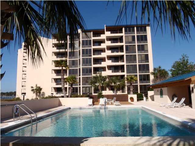 Price to sell! Enjoy quiet boutique community located inside gated golf community. Wonderful floor plan with all rooms enjoying floor to ceiling view of water. This unit has the best view in all Bay Point. Look up and down the Grand Lagoon. Directly across from St Andrew State Park with a view of the pass, and shell Island. Incredible sunsets from your balcony, plus you can watch the boats come in and out of the bay. Almost new stainless kitchen appliances and full size washer and dryer. Located in Bay Point, a gated community with 2 world class golf courses, clay tennis courts, four restaurants, a full service marina, and an on site Wyndham resort. Bay Point is home to not one, but two championship golf courses! The Meadows course boasts 6,913 yards while the Jack Nicklaus designed course