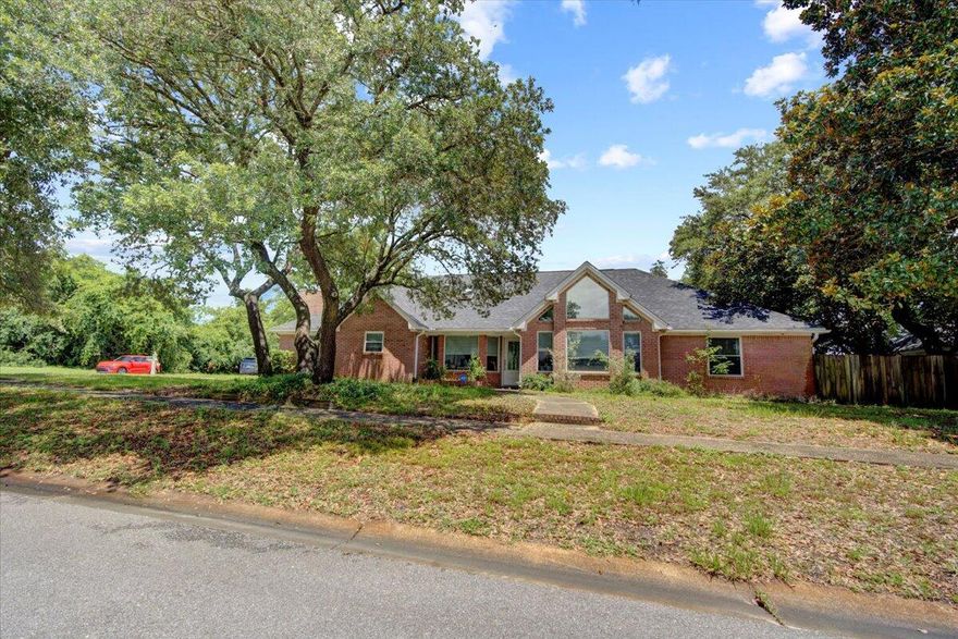 Great location!  This spacious home is located on a large corner lot in the desireable Castelar Subdivision, just minutes from Hurlbert Field, and beautiful beaches.  A new Roof, HVAC and water heater were installed in 2018.  Beautiful, vaulted wood ceilings and a wood burning fireplace.  The open kitchen has stainless steel appliances, granite countertops and a large breakfast bar.  3 bedrooms with an extra room that could be used as a 4th bedroom, office or additional living space.  The Master Bath has his and hers vanities, a soaking tub and separate shower.  The Seller's are replacing the carpet in the home.