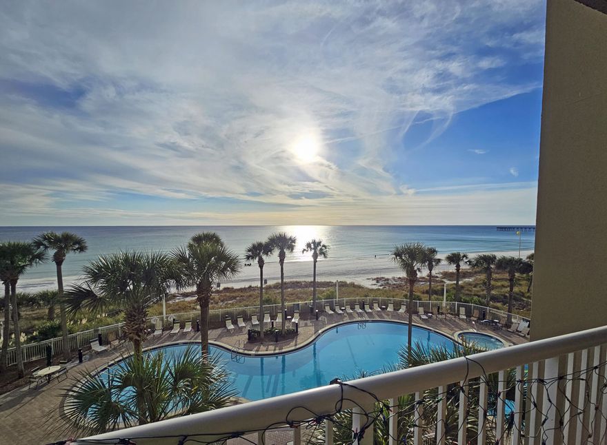 PRICED TO SELL! Act quickly, this won't last long! This freshly painted beautiful 2 bedroom, 2 bath condo is located at the fabulous Grand Panama Beach Resort that boasts a beachfront pool, a rooftop pool (both pools are seasonally heated), a kiddie pool, 2 hot tubs, gas and charcoal grills, a seasonal tiki bar, a fitness center, 24/7 security, a gift shop and general store, and covered garage parking! The condo features a wonderful floorplan, granite countertops, and tile floors throughout. A gorgeous oversize balcony where you can sit back and relax while watching the waves crash and the dolphins splash.The primary bedroom has a separate entrance to the balcony and offers a beautiful view of the water! There is also a newly installed wine cooler! Perfect for entertaining or a nice amenity for a vacation rental!

Located just one floor down from the covered walkover, this condo is in a perfect spot for a vacation rental or full-time beach living! 

HVAC, water heater, washer/dryer, and refrigerator all replaced in 2019/2020. Range/oven and microwave replaced in 2022. 

Call today to view this incredible condo
