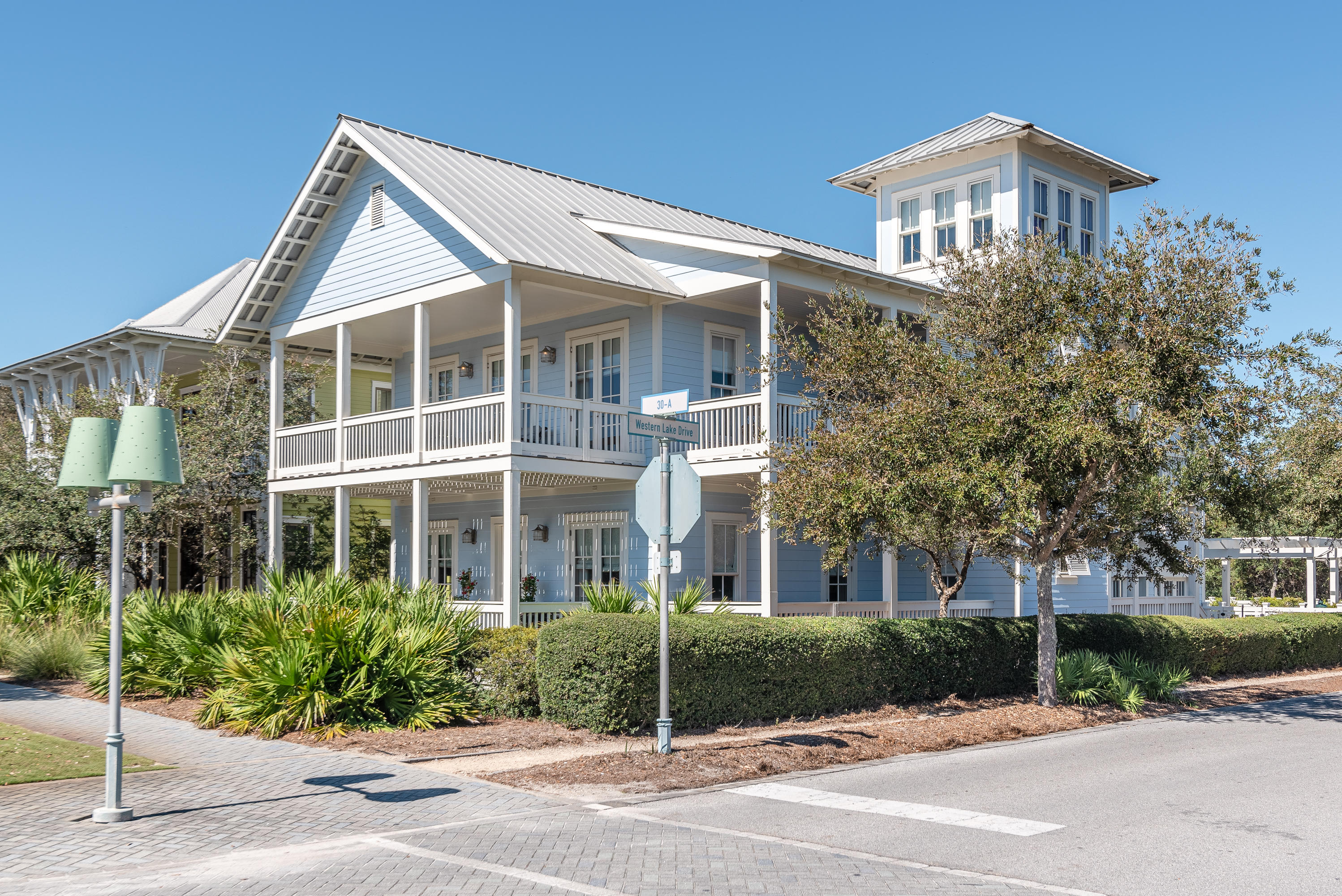 A beautifully renovated Phase 1 WaterColor residence perfectly represents the relaxed elegance of this iconic coastal community. 47 Western Lake Drive is an exceptional coastal home primely positioned along Scenic Highway 30A in the heart of WaterColor's iconic Town Center and just across the street from Gulf of Mexico and dedicated private beach access.Thoughtfully designed for entertaining, the expansive kitchen features Cambria quartz countertops, modern shaker cabinetry with soft close hinges and a full suite of Viking appliances including 36'' gas range, commercial grade refrigerator, dishwasher and microwave. Flowing from the kitchen, the home's open dining area can accommodate the entire family for memorable holiday meals enhanced by a first-floor wet bar with Viking beverage