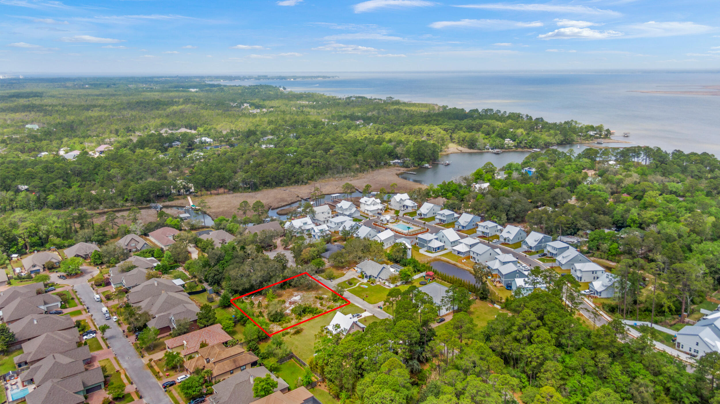 Large, cleared lot in the established neighborhood of River Bend. Build your dream home and enjoy all the conveniences of Grand Boulevard, Sandestin and 30a such as shopping and fine dining as well as weekly farmers markets, events and fun family outings. The beautiful beaches of South Walton are just minutes away!