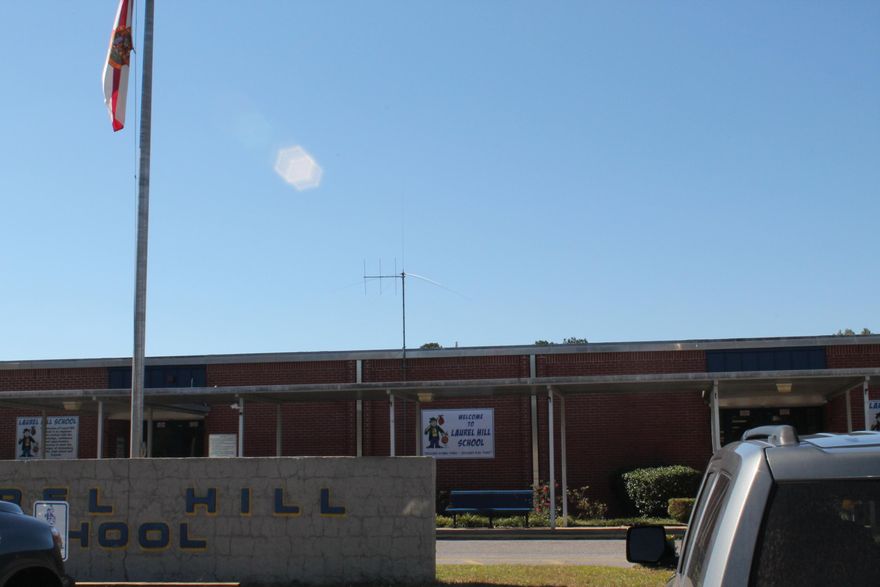 0.44 Acres located in the heart of Laurel Hill and across from the K-12 school. This is 2 lots. Seller has a quote to demo mobile home and will credit buyer $2,800 for demo at closing.