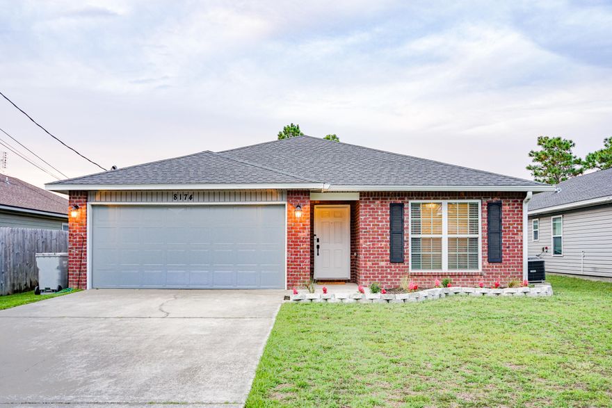 Beautiful contemporary home in popular East Navarre, just minutes from shopping, schools, and entertainment. Located in a family-friendly neighborhood with no HOA, this home offers an open-concept layout centered around a granite kitchen with large island. The private primary suite includes a spacious bath and walk-in closet, while additional bedrooms share a convenient full bath in a split layout. Updates include tile flooring throughout all living areas, bedrooms, and closets--no carpet--and modern light fixtures. Outside, enjoy an almost quarter-acre lot and two-car garage. Please note: home is tenant-occupied and current furnishings differ from photos.