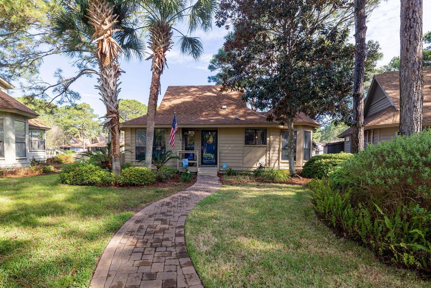 This cottage is completely renovated, furnished beautifully and move in ready. The living, dining and kitchen are all open and give a spacious feeling extending out to a wonderful, screened porch which overlooks the lake.  The kitchen is a chefs dream. You will find beautiful gray cabinets with a contrasting white backsplash, quartz countertops and stainless steel appliances which include a wine cooler and ice machine. Soft coastal colors and tile flooring, which looks like wood, are found throughout the home. An electric fireplace is contained in the TV cabinet. It gets even better when you step outside to the LARGE deck and dock on the water. So relaxing and serene. There is a storage room off the deck for all your beach chairs and bikes. Black GOLF CART conveys. Short term rentals.