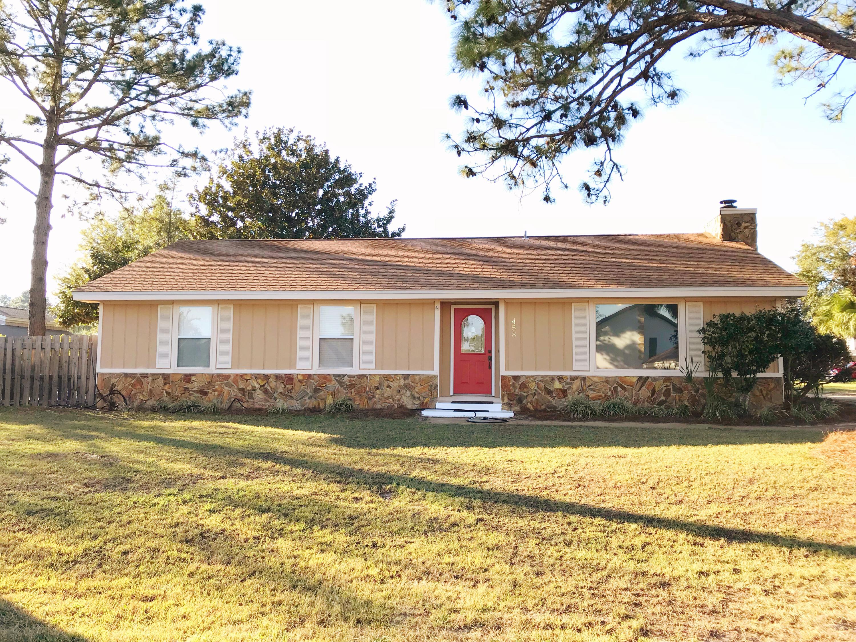 Beautiful home located on a corner lot in the gated Bay Point Community. Move in ready! Recently installed tile flooring that looks just like hardwoods. Granite countertops in the kitchen. New roof and skylghts that bring in a lot of natural light to the living room. Living room has a vaulted ceiling and a real wood burning fireplace. Master bedroom with walk in closet, private bath and double vanity. Yard has sprinkler system. Big bedrooms! Freshly painted interior as well as new carpet. Two car garage. Privacy fenced back yard with screened porch just off the eat in kitchen. Bay Point features a marina, two golf courses, restaurants, and 24 hour security.