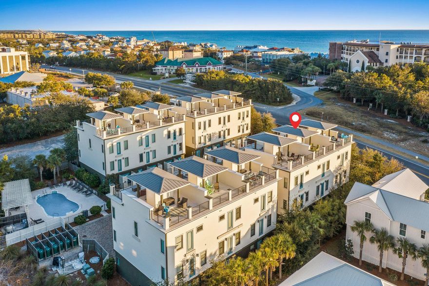 Rare opportunity to own 1 of only 12 townhomes in boutique style setting directly on world famous Hwy 30A! Enjoy sunsets, sunbathing and outdoor events on your one of a kind ROOFTOP DECK w/ 360 degree views!!  This beautifully remodeled, over 2400 square feet home boasts, 4 bedrooms, 4 baths, 2 living rooms, a community pool and 2 dedicated parking spots, all while being in walking distance to everything Blue Mountain Beach has to offer!!  Incredible opportunity for an investment property or second home.  Being sold FULLY FURNISHED so you can capture rental income immediately!!  Don't wait, won't last! 3D tour coming soon!