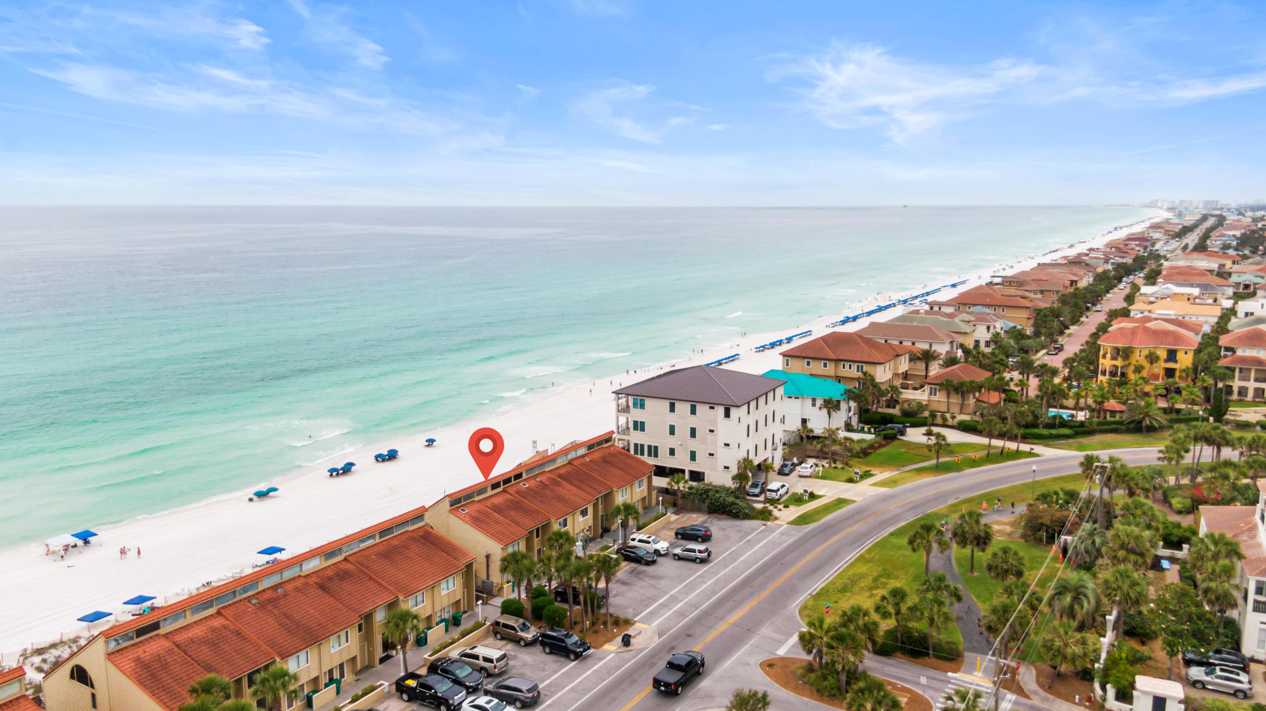 Dip toes in the sand when stepping out the door of this incredibly renovated beachfront masterpiece that was gutted and brought up to current code. You will love the quiet, uncrowded private beach with a security guard in front of Greenreef Townhomes. The property is in A+ condition. It's never been used as a rental property. Although, multiple rental projections come in over 175K. There is a generous 1200+ sq ft of Trex decking throughout the three porches. You'll find king-size beds in every room. The combination of natural oak hardwood floors and tile throughout makes this property superior to those surrounding it. The master bedroom is on the top floor facing the beach, with an additional loft currently used as an office. On the main level is a gourmet kitchen with lots