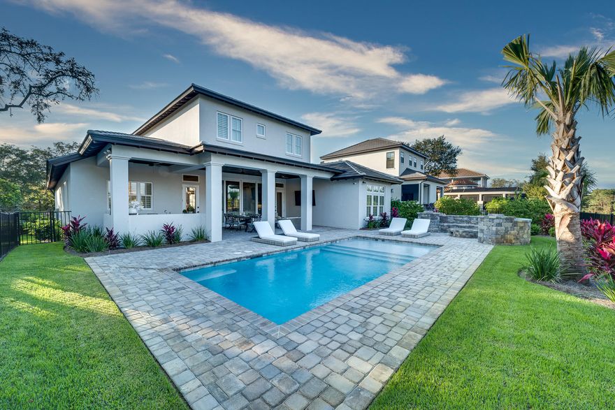 NEW CUSTOM HOME '' SOLD FURNISHED''  This home is a must see, looking for a turn key home look no further....Outdoor living at its best redefined in exemplary style with a generous pool with sun shelf, summer kitchen and a large fire pit. The interior features a vast array of Amenities and Touches, including a Pecky Cypress ceiling in living room, Custom Tile work, Wide Plank Wood Floors and a sweeping two story foyer. With a sought after South side location...  Come See this Great Home Today !