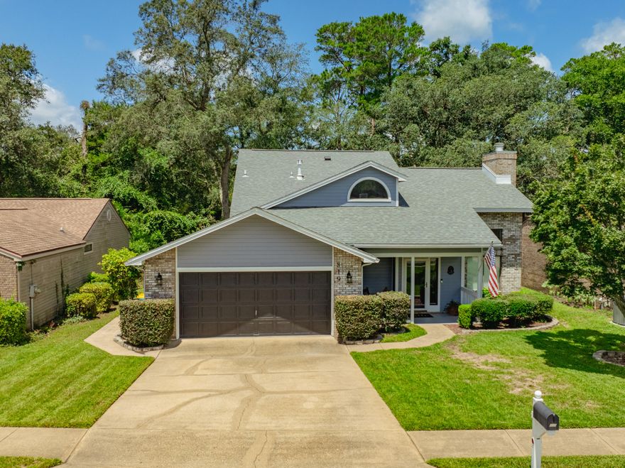 Explore the charm and elegance of this award-winning Barton-built home, a highlight of the 1991 Parade of Homes, nestled on a picturesque golf course lot. Enjoy breathtaking views of nature and greenery from every angle. Key Features:
-Brand new HVAC
- Recently replaced roof (2021) and updated water heater (2016).
- Spacious, light-filled rooms with soaring ceilings and hand-scraped engineered wood floors.
- Three sliding glass doors leading to a screened porch and covered patio, perfect for outdoor relaxation.
- Updated kitchen featuring granite countertops, tile floors, brand new refrigerator,  complemented by a convenient built-in desk area. 
- Serene master suite on the main level with golf course views and direct access to the patio - Two generously sized bedrooms upstairs with a shared bathroom.
- Laundry room equipped with custom cabinets for added storage.
- Oversized garage providing ample space for all your needs.
Immerse yourself in the tranquility and beauty of this exceptional home. Schedule your showing today!