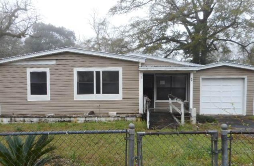 Great option for any buyer. The home has 3 bedrooms, 1 bathroom, and an attachedgarage. Tile flooring throughout. With some updating this home could besomeone's dream home. Come see how you will customize this.