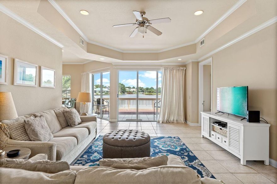 Rare opportunity to own a first-floor lakefront 3BR-3BA condo at Sandestin Resort with revenue potential of $50K! 2214 Crystal Cove Lane is a premier waterfront condo located in the Crystal Cove neighborhood at Sandestin Resort. The location is tucked away yet convenient to all that Sandestin has to offer. With 10 ft ceilings, this 3BR-3BA is flooded with natural sunlight and offers a spacious floor plan, a covered porch, and a sunny deck overlooking Crystal Lake. The comfy living area, updated kitchen, breakfast room, and primary bedroom all open through glass doors to the lakeside patio and deck. Both guest bedrooms offer adjoining full baths. There is a full-size laundry room, assigned parking, catch and release fishing, and access to a community swimming pool. The Sandestin beach resort amenities are available to property owners.  