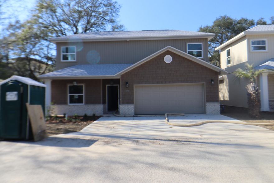 For comps only, sold before listed. Picture is of a similar home. Builder offering to pay up to 4% of purchase price towards buyers closing costs and rate buy down if using preferred lender. New construction super close to shopping and very convenient to both bases. This 4/3 home has 9 Ft. ceilings w/ impressive crown molding, has LVP flooring throughout the entire home except wet areas that are tiled, and 5 1/4 '' baseboard. As you enter the home through the covered porch, bedroom 1 and bath 1 are located at the left of the home. Continuing down the hallway, the kitchen is on your right and has white painted cabinetry, will have stainless appliances and has granite countertops. The master bedroom is at the left rear of the home. Great room is located at the front of the kitchen.