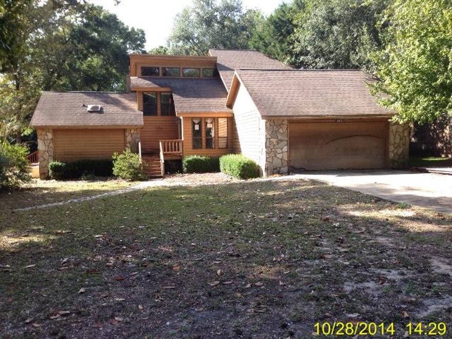 Property has been temporarily removed from the market for possible donation. Lots of Potential in this spacious 3 Bd / 2 Ba home... Situated on large 1/2 acre lot, the home features stone fireplace in the living room & vaulted ceiling, large eat in kitchen, master suite features double vanity & sliding glass doors to rear deck. The upstairs loft is perfect for office space. Don't miss out on all this home has to offer. Prior to seller receipt & approval of the full title package from foreclosure, title to the Property will be conveyed by a quit claim deed.