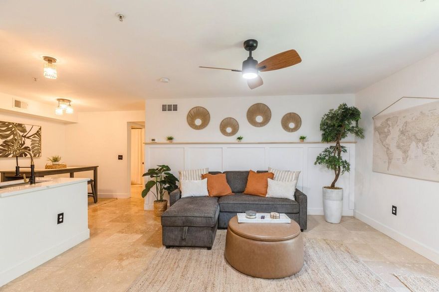 Now Showing!  This 1-bedroom, 1-bathroom condo has been beautifully renovated and is ready to impress. Located in the heart of Destin, it's just under a half mile from shopping, restaurants, a dog park, and various attractions. Whether you're looking for a full-time residence or a rental opportunity, this property fits the bill.The open-concept kitchen, dining, and living area is spacious and inviting, with easy access to a balcony--perfect for entertaining or relaxing with loved ones. The kitchen features brand-new cabinetry with soft-close drawers, stainless steel appliances, and quartz countertops. The entire condo has been freshly painted, with a new accent wall adding a modern touch. Tile floors throughout make for easy maintenance.