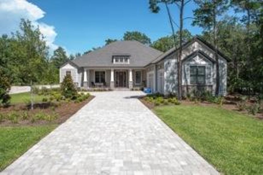 This newly designed FULLY FURNISHED Arthur Rutenberg Homes floor plan (Shearwater 1230) is open in the beautiful gated development of Wild Heron and is built on the Greg Norman designed Shark's Tooth Golf Course. This single level home features 3 bedrooms, 3 baths, open concept floor plan with a breakfast bar overlooking the great room, wood floors, granite countertops, casual dining, 3 car garage and a large 572 sq. ft. lanai with a summer kitchen and overlooking a swimming pool with spa. The home is being built with a high level of interior finishes and features (see specifications attached). Design features include 14'-9'' high vaulted great room ceilings, 11'-4'' foyer ceiling, 11'-4'' dining room ceiling, 11'-4'' c