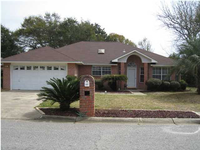 Beautiful Home with a POOL in EAST Navarre with Deeded Access to the Sound with a great beach area!! You are only a 2 minute walk to the waterfront, 5 minute drive to Navarre Beach and the Gulf of Mexico and 10 minutes to Hurlburt AFB. The large kitchen offers an island, lots of natural light from the windows and the skylight. The open floor plan allows for you to be a part of it all and the large living area boast a corner wood burning fireplace. Step out back and enjoy the 168 sf Florida room that overlooks the large in-ground pool. The back yard boast a few entertainment levels, with a small deck to one side and a large second level deck that will provide you with views of the sound through the tree tops and a full view overlooking the backyard. Call to schedule a walk through and