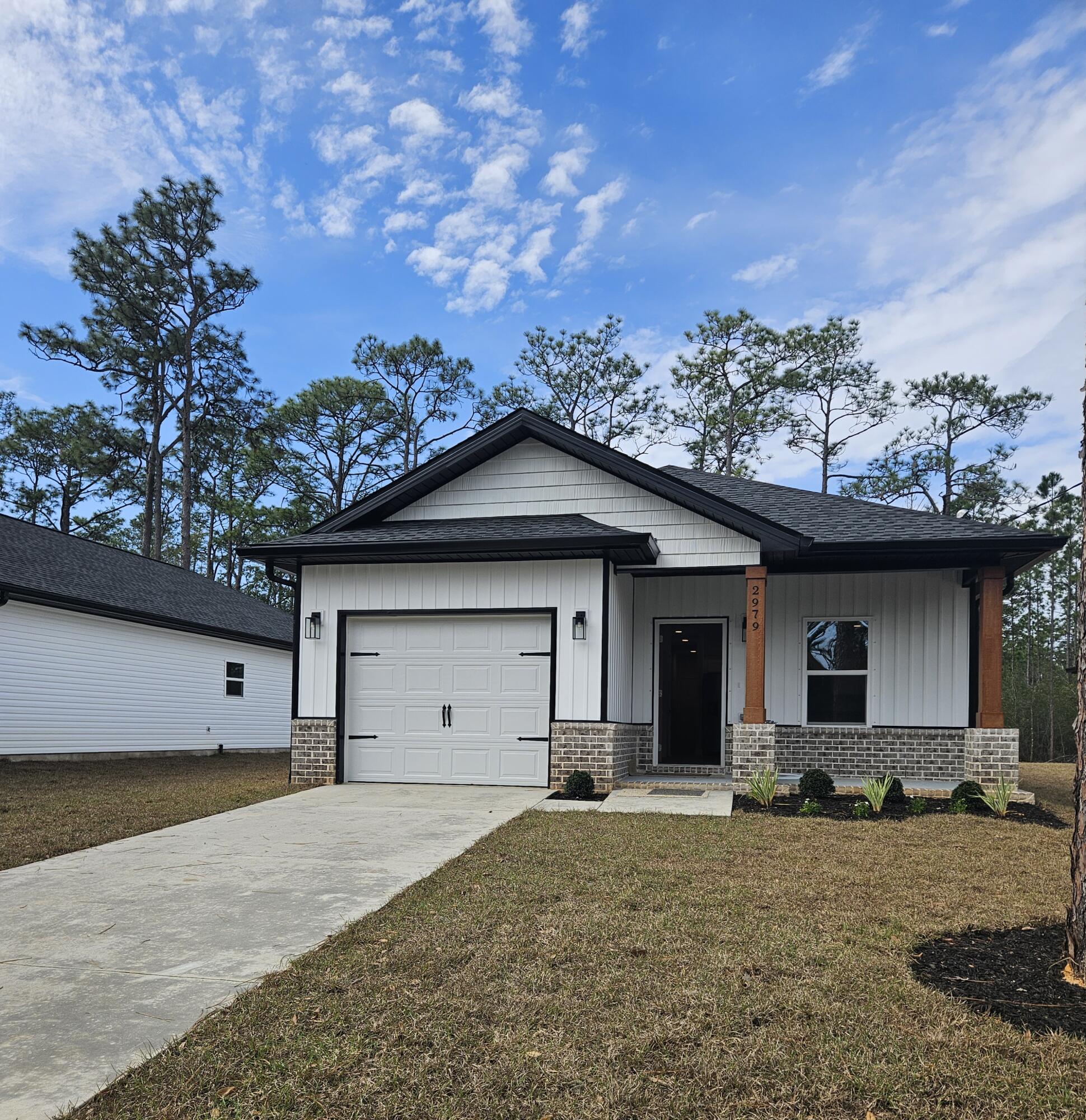 Beautiful new build in a prime location near the interstate! Avalon Beach Neighborhood also has no HOA! The home features a trey ceiling in both the living room and owner's suite. The kitchen is chic with black granite countertops and a farm sink. LVP flooring covers the entire home in a natural wood color. 2979 28th Ave. offers charm and convenience!