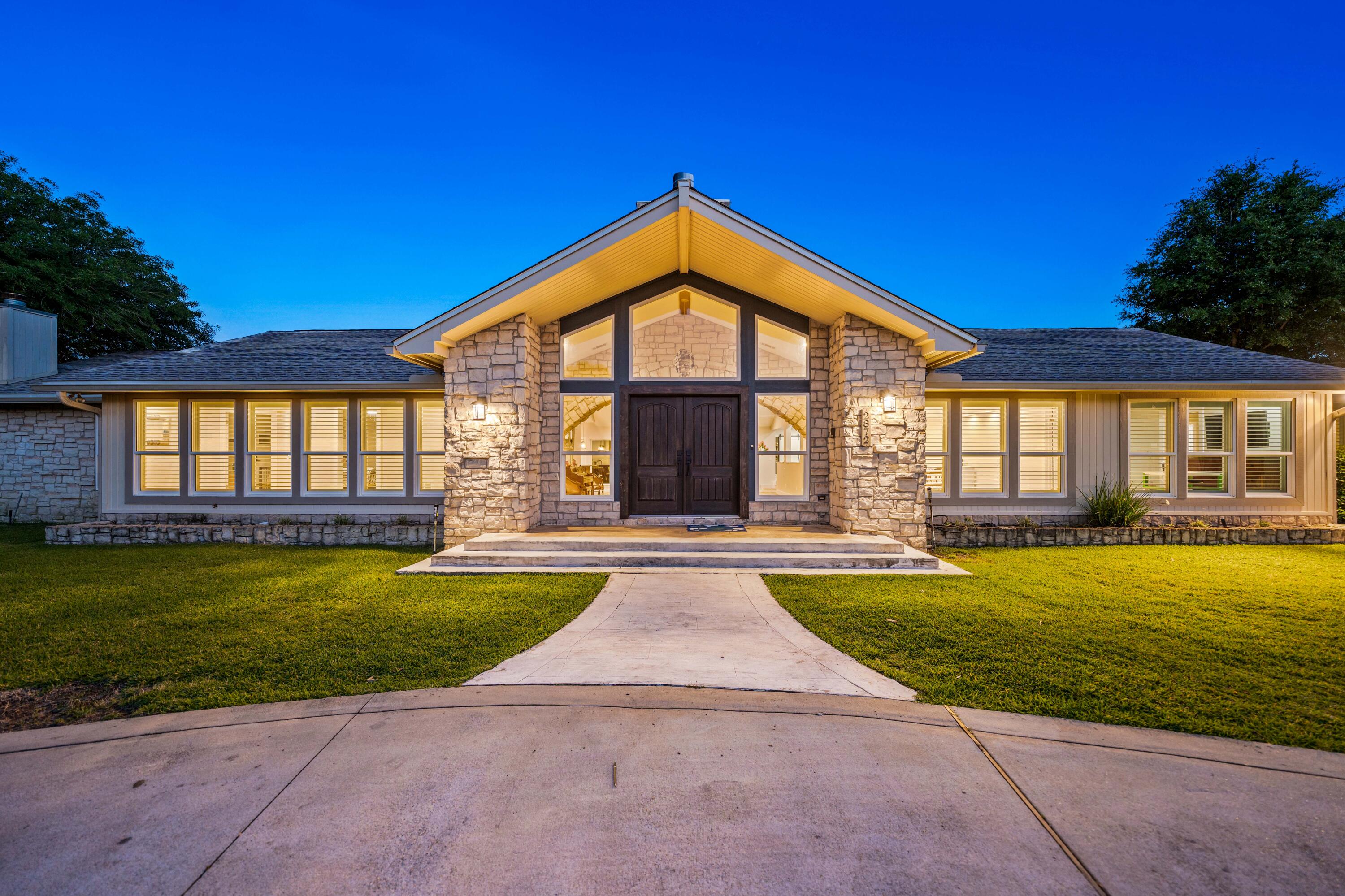 Impeccably renovated home nestled on the 11th Hole of Hidden Creek Golf Course. Every corner of this residence has been meticulously designed and upgraded. Featuring several updates in 2022 including 46 new impact windows, 5 impact glass doors, a new roof, luxury vinyl plank flooring, and plantation shutters, this home offers unparalleled modern comfort.Step inside to discover the Well-Crafted Arched Stonework of the Living Room Fireplace, the Soaring Cathedral Ceilings, elevated Wet bar with Built-In Kegerator, and the expertly designed open floor-plan.Adjacent to the living room you'll find the updated gourmet kitchen equipped with a custom vent hood, shiplap accents throughout, granite countertops, double oven, ample storage space, and top-name stainless steel appliances. The backyard screened-in oasis is ideal for entertaining featuring a large pool, ample space for seating, and built-in bar area. The backyard has direct access to the large laundry room with plenty of cabinetry, making an easy trip for dirty pool towels.
The primary suite is a retreat with 12'+ Cathedral Ceilings, a stone fireplace, and a luxurious primary bath featuring dual vanities, a resort-style shower, and a soaking tub with pool and golf course views.
Just outside the master is a unique guest bedroom with a one-of-a-kind special ensuite bath equipped with its own steam bath and sauna!
On the opposite end of the home you'll find two additional guest bedrooms which share a large renovated jack and jill bath featuring dual vanities, granite countertops, and a combined tiled shower/tub. Next to these bedrooms is a large flex space that could be utilized as an office. This home is also equipped with a massive three-car garage hosting a separate flex space and ample storage throughout.
The Hidden Creek Golf Course, an 18-Hole Championship Golf Course known for its excellent conditions, beautiful landscape, rolling Terrain and scenic layout, which also offers a well-maintained driving range, chipping area, and putting green.((Holley By the Sea is a highly desired community to live in with superb amenities. Nearby is a 50-acre Recreational Center & Grounds, equipped with swimming pools, gym, sauna & steam room, lighted basketball courts, 8 clay tennis courts, playground, boat launch, and dock & beach area on the Santa Rosa Sound!