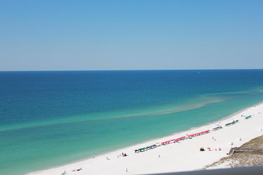 Best breathtaking view at Navarre Beach located on the 14th floor of Summerwind Condos. This 2 bedrooms, 2 baths with a bunk room condo is ready to be furnished and decorated with your own personal taste to make it your vacation getaway or vacation rental income producing property. This unit has 2 large carpeted bedrooms, plus carpeted bonus bunk room and 2 full baths with tile in the hallway, bathrooms, kitchen, and laundry room. The master suite has private balcony entry and master bath with double vanities. Seller paid the special assessment for painting & waterproofing with balcony railing restoration which was due on October 24, 2016 in the amount of $3,118.17. The other special assessments in the same amount due on 10-24-17 and 10-24-18