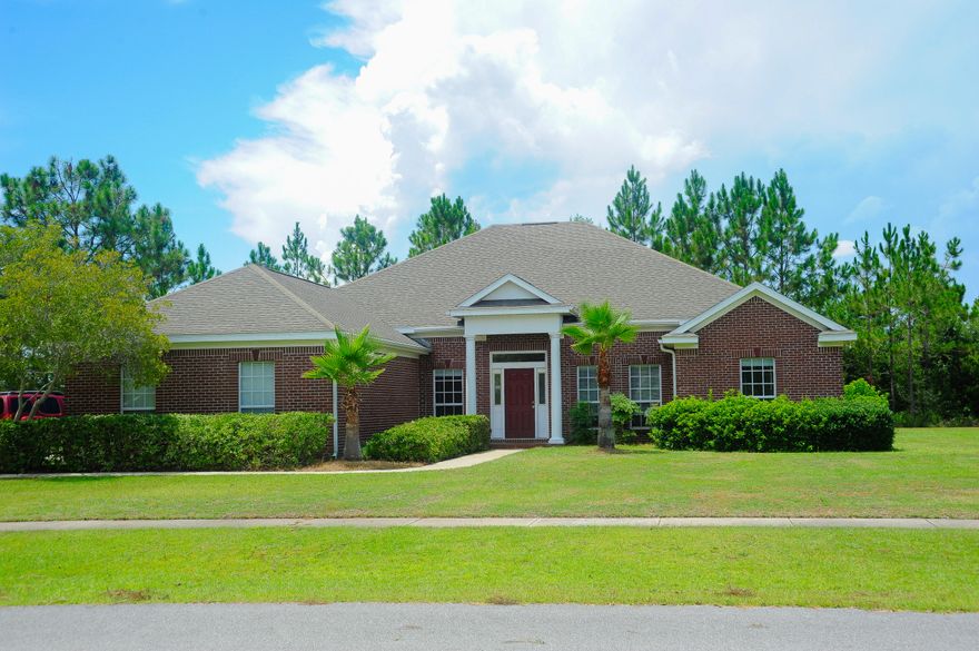 New flooring! Feel welcome as you turn onto Windswept Boulevard and drive through this stunning entrance, into Windswept Estates, Windswept Estates is a private golf course community, highly rated in Golf Digest Magazine. A peaceful community with amenities including a large swimming pool, tennis courts, picnic area, and more. This open concept, 4 bedroom home, is located on a peaceful cul-de-sac. This spacious home has a split open floor plan, giving privacy to the master bedroom, with plenty of room for entertaining, and enjoying family time. Included is a private dining room, and a separate sitting/reading/office room, off the front entranceway. Crown molding throughout. This home sits on over a 1/2 acre.