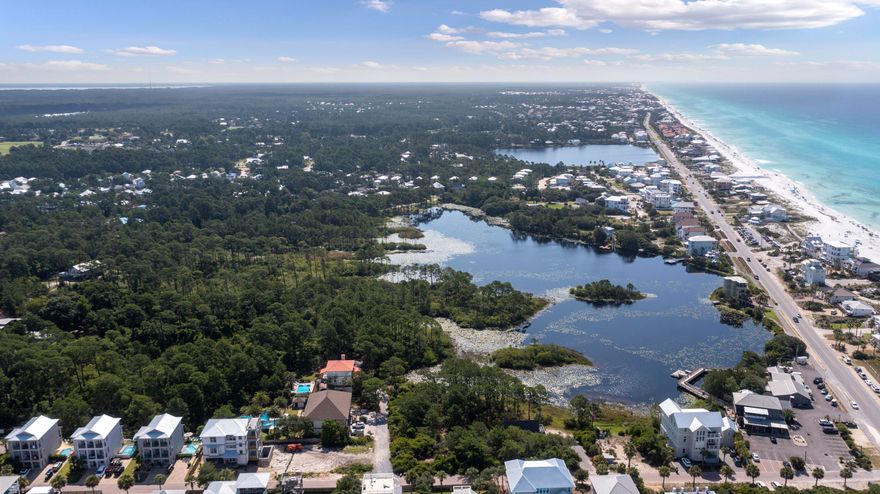 One of the Largest lots for sale on 30a. This Half Acre lot situated on a rare coastal  dune lake, makes it  perfect for a family residence or an one of a kind rental. With an easy walk down the street to the beautiful white sand beaches of the emerald coast or one of the best restaurants on 30a.This lot is suitable for a 7000 sq ft single story buildable area.  Seller has plans for a 5100 sq ft  with a  pool and pool house with builder cost ready to go. please call for information on that.  Plans and professional designer selections can be provided to the new buyer. You will have a hard time finding a better lot to build your DREAM HOUSE on. Call today for more information.