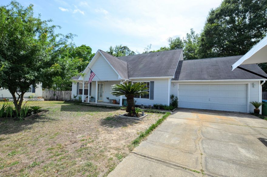 Located in the ever popular South Crestview area, this home is one for your radar. Just a few minutes drive to Duke Field, interstate access, elementary schools, hospital, and more; this 3 bedroom 2 bath home is just right for the taking. Master bedroom is downstairs and convenient as it is just off the living room. A large tiled galley tiled kitchen opens to the dining area which leads to the open living room with vaulted ceilings. Home has fresh paint, flooring, and lots of special touches that make this one a must see to appreciate. With a hard to find flat yard, this home has fenced back yard, large open deck and lots of parking. Call today!