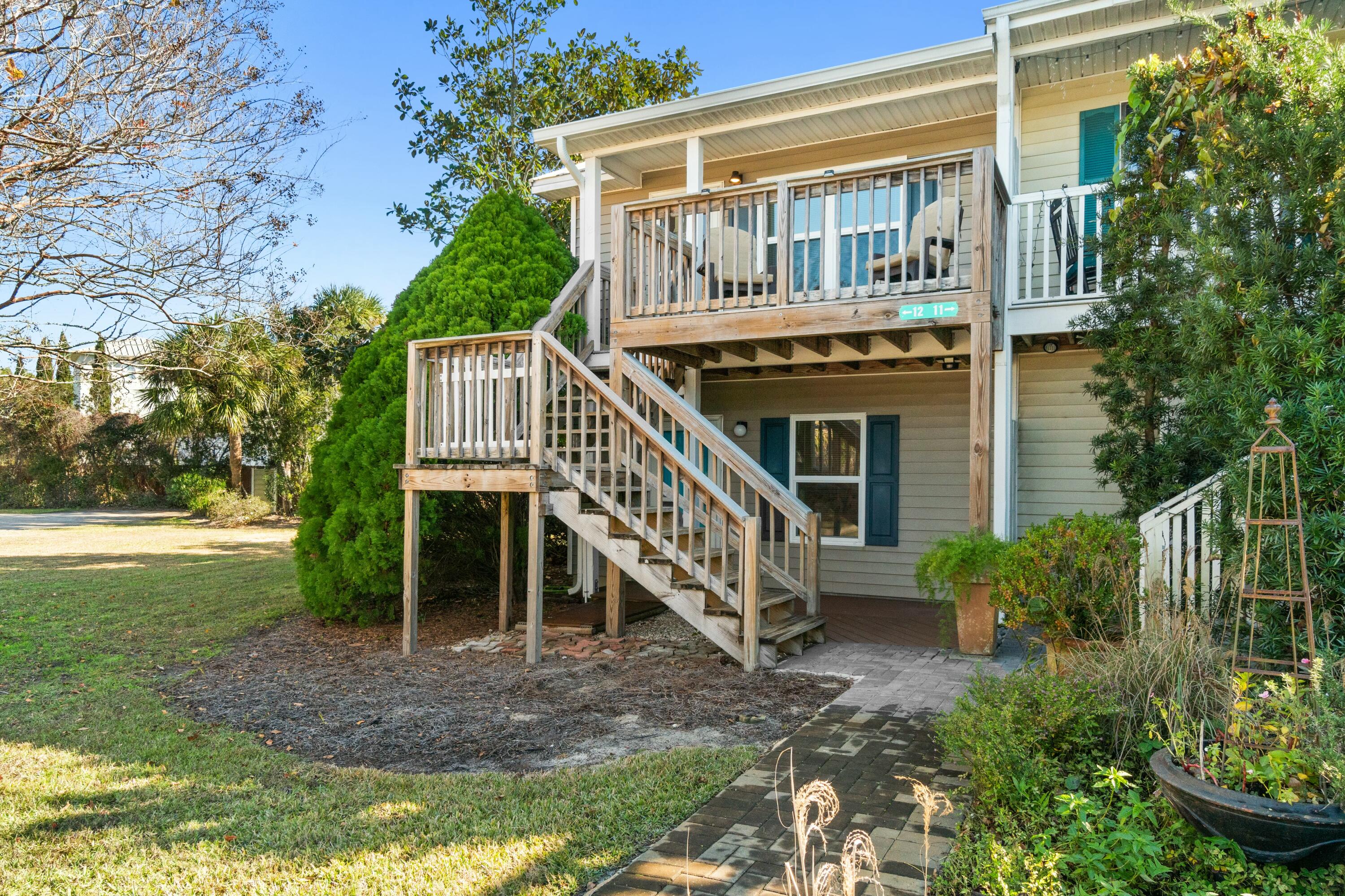 LOWEST PRICED TWO-BEDROOM TOWNHOME EAST  OF CAMP CREEK ON 30A. And it's NOT a fixer upper. Low monthly HOA fee. Beautifully maintained, furnished and updated, this roomy townhome comes with DEEDED BEACH ACCESS just across 30A. Two assigned parking spots are out front. Updated kitchen and baths. Two screened porches, a covered patio and a partially covered porch.Sold fully furnished (with the exception of personal property in closets). Premium East 30A location only minutes to Camp Creek golf course, Alys Beach, and shopping and dining at Watersound Origins (from Publix to Ambrosia). Extra privacy and green space as this beach townhome is the end unit. This is one you don't want to miss. Please confirm all information.