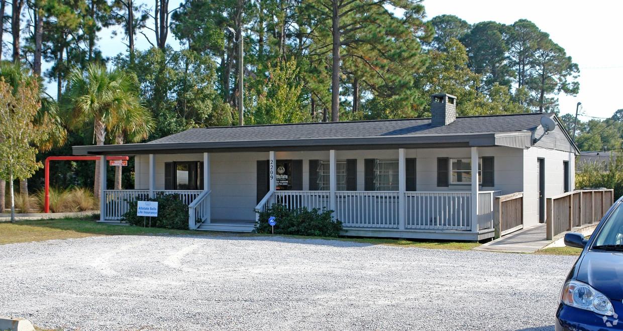 Zoned C2 commercial, this 1,620 square foot commercial office building is located on one of the busiest corridors in Panama City, 15th Street. Located on quarter acre (.25+/-) lot with 87 frontage feet, this building is constructed of concrete block and offers ample parking for a growing business. Building consists of a large 20x15 lobby area and customer reception, two offices, one bathroom, kitchenette, and storage room. Depending on customer preference, the storage room could be converted to a third office. In addition to being constructed of durable concrete block, this office contains wood ceilings and a brick fireplace in the reception area which warms and creates a very nice feel for customers.