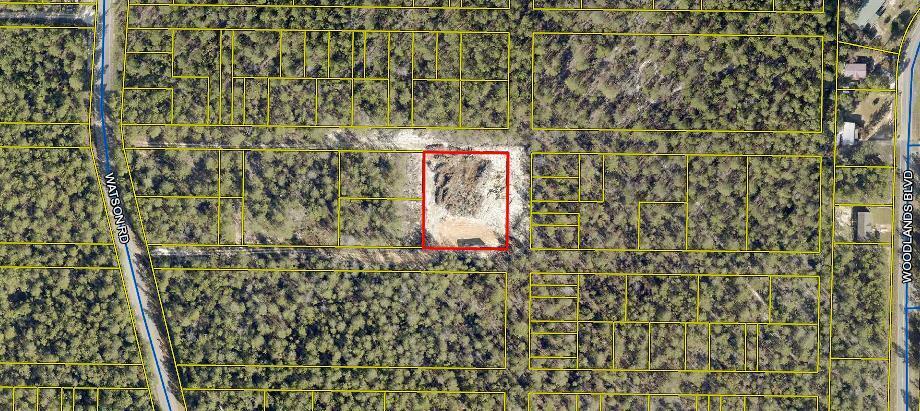 This property has a mobile home that has not been setup. 3 bedroom 2 bath single wide, needs work. This property includes 14 lots totaling 1 acre. It would be perfect for a mobile home park or tiny home park. Buyer to verify all measurements.