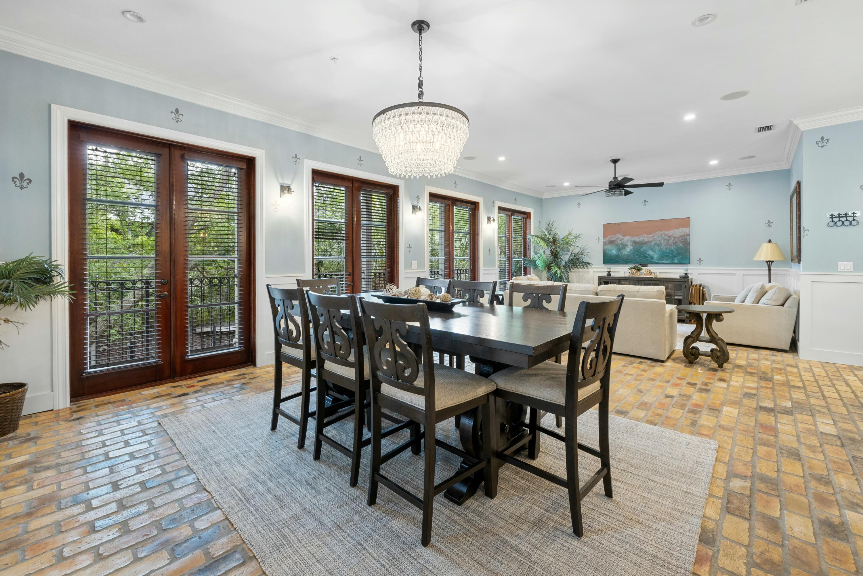 Welcome to this quintessential Baytowne Wharf condo nestled in the heart of the gated community of Sandestin Golf and Beach Resort, this condo marries coastal relaxation with French Quarter vibes. As you enjoy the walkable lifestyle that draws so many to Baytowne Wharf, from live music and dining to tennis, golf, boating and oh so much more, you will appreciate the attention to detail and optimization of space in this uniquely renovated condo. Steps away from all the entertainment and action of Baytowne Wharf, you will feel miles away from the crowds as you enter the courtyard leading to your new condo. Walking into the front door is like walking into your own private retreat! Impeccably renovated, these owners left nothing out! You will be embraced by the open floorplan inviting you and your guests to enjoy gathering, dining and making those memories that last a lifetime. the wall of gorgeous French doors masterfully frame the living and dining area drawing the outside in as you have a gorgeous view of the Tupelo Courtyard below. While the downstairs is truly something to behold, the two bedrooms, two bathrooms and custom hideaway twin bed pull-outs makes this condo set apart from anything like it in Fisherman's Village. You have to see this space for yourself to understand how amazing it really is! This condo is turn-key and already established on a rental program. Be sure to make this condo your next best step in your Real Estate portfolio.