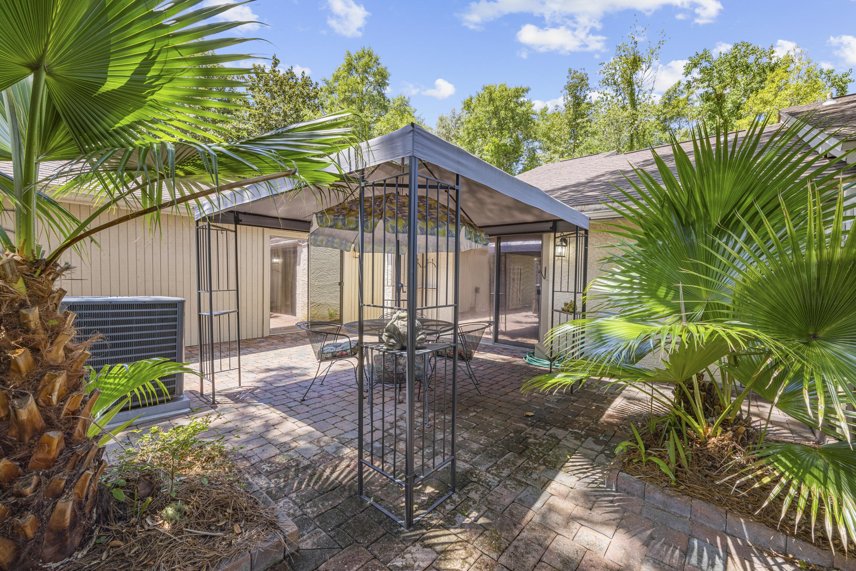 Welcome to this charming single-story patio home featuring three spacious living areas. Perfect for relaxing or entertaining! This furnished and turnkey property is an excellent opportunity for investors or first-time homebuyers. Enjoy a private courtyard with a gazebo, ideal for hosting guests or unwinding outdoors. Inside, you'll find vaulted ceilings that enhance the airy, open feel of the main living spaces. A bonus room currently functions as a home office, providing flexible use for today's lifestyle.The home also includes brand-new appliances, including a refrigerator and stove/oven, and a 2-car garage for added convenience. Two of the bedrooms feature access to their own private outdoor living areas, perfect for quiet mornings or evening relaxation. 💰5k w/accepted offer!
