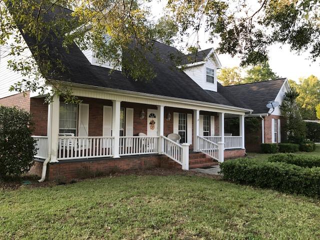 Being sold as a short sale. Beautiful brick family home in the heart of DeFuniak just one block off the lake yard. The living room flows into the open kitchen and dining room area giving a great balance of openness for family gathering. The nice sized master bedroom with en suite master bathroom includes double walk-in closets. The 2nd and 3rd bedroom share a Jack and Jill bathroom. Upstairs has a huge bonus area that could be a great gathering area for kids, hobby area, office, or additional bedroom space. The spacious back porch offers privacy and comfort. The home has a two car attached garage and one car detached garage that has water plus electricity making it a great workshop space. Must see! All measurements believed to be correct, but buyer should verify all measurements.
