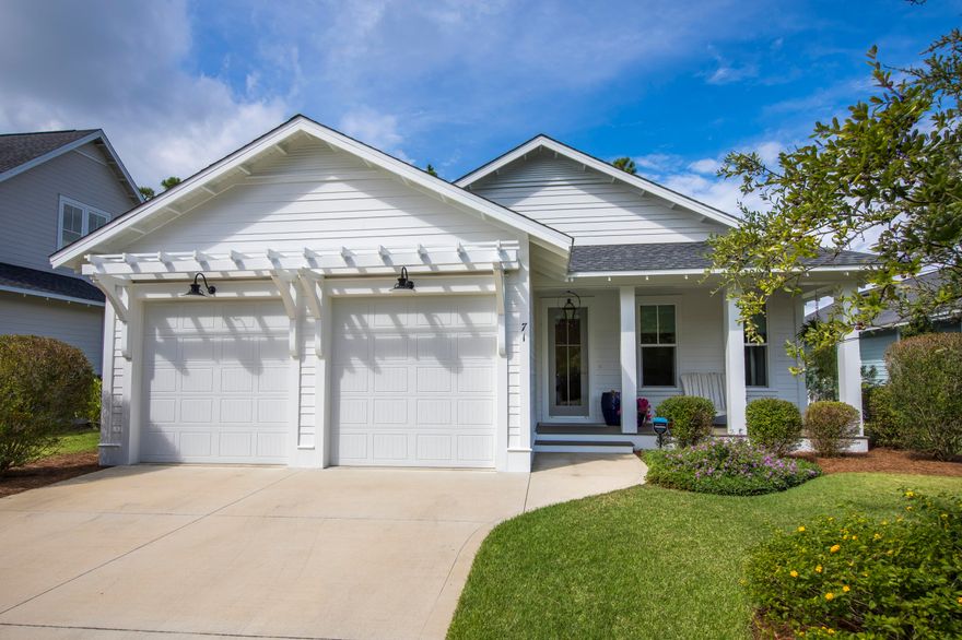 Welcome to 71 E Sandlefoot Lane. This beautiful home is located in the back portion of the Pathways of Watersound Origins, which means no thru traffic of any kind! The original owners spared no expense during construction equipping this home with Medallion wood floors, shiplap in the family room, foyer and kitchen island. The open floor plan will truly make you feel at home as soon as you walk through the door. There are 3 bedrooms and 3 bathrooms along with an office that could be your 4th bedroom. The little details are found throughout as you notice custom window treatments, air purifier system, and the beautiful fireplace in the family room. Take a short walk following the path directly behind the house to the community pavilion to enjoy golf, tennis, pickleball, and swimming.