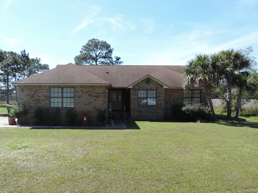 Perfect starter home or for downsizing. Located in Holley by the Sea and only a short walk to all of the amenities of HBTS. This 3 bedroom 2 bath with side entry garage is ready for you. All appliances including the front load washer and dryer remain. The high ceilings through out the living room, dining area and kitchen give an bright open feel. Tile floors are in all areas but the carpeted bedrooms. The Master suite has a double door entry with adjoining master bathroom featuring a double sink vanity and walk in closet. A sunroom off the dining area is perfect for enjoying a cup of tea or coffee in the morning before you start the day. With a storage building toward the back of the property you have plenty of room for yard equipment or storage. Schedule your tour today.