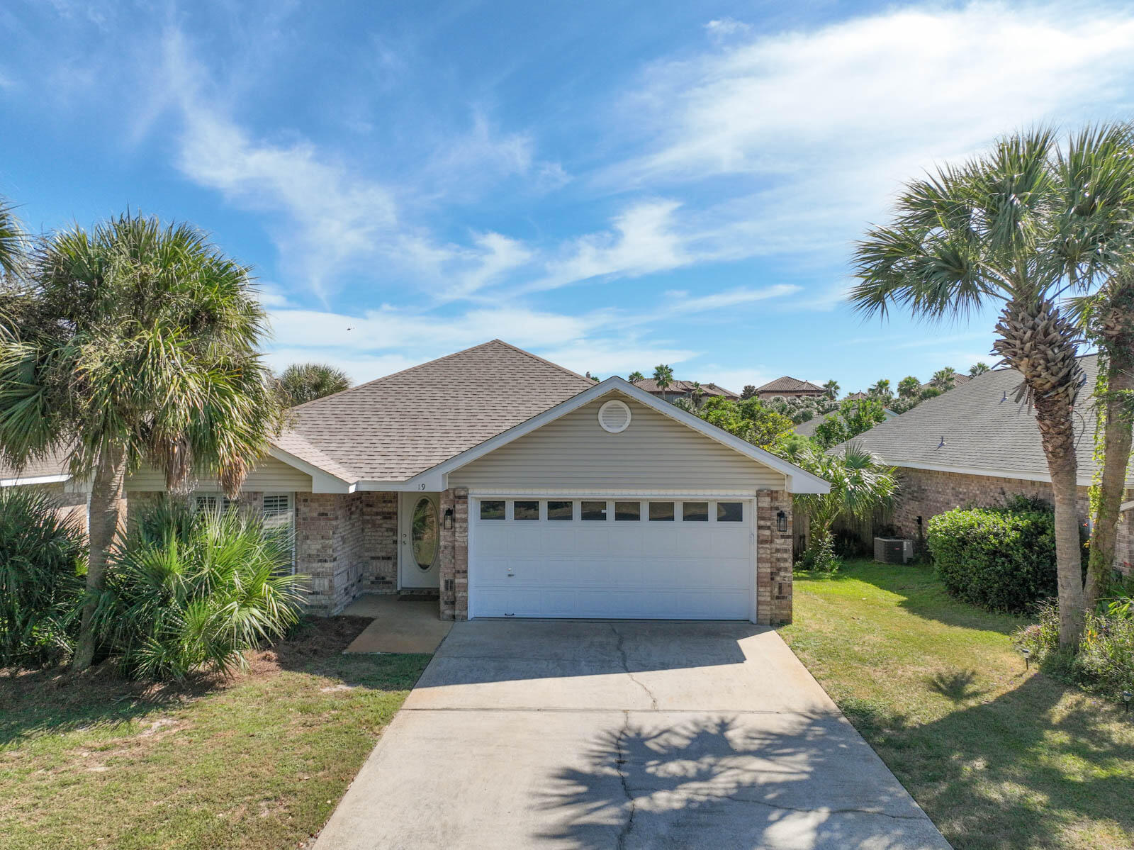 Seller is motivated and offering $5K towards buyer's closing costs!    19 Whitecap Way is nestled in the highly sought after Seaspray subdivision located in Miramar Beach. This property is perfectly located one block from the beautiful Gulf of Mexico - offering a private, deeded beach access.  Just minutes away, Sandestin Golf and Beach Resort offers golfing, fishing, tennis, dining, live entertainment, watersports and The Silver Sands Premium Outlets offers over 110  shops and restaurants - all in easy reach.The three bedroom, two bathroom home is newly updated including the roof, new AC and back deck as well as the kitchen and laundry appliances.  Kitchen, dining area and family room is an open floor plan perfect for entertaining and includes a fireplace and a