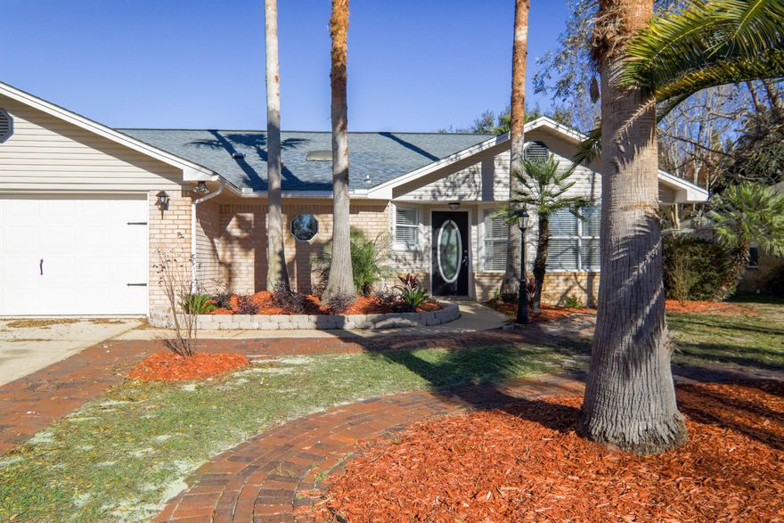 Opportunity knocks in this newly remodeled pool home! Upgrades that have been include brand new: interior paint, exterior paint, 14mm hardwood laminate flooring, carpeting, ceiling fans, light fixtures, landscaping, remodeled kitchen with custom glass backsplash, stainless steel appliances, and granite countertops in the kitchen and bathrooms. New pool liner is on order. Inside the home you will find a fantastic split bedroom floor plan. Home also features a large bonus room overlooking the pool that has a beautiful real wood ceiling. Room could be used as a Florida room, large office, or even as an additional living room. The backyard features a glistening in-ground pool that is just waiting for you to dip into.